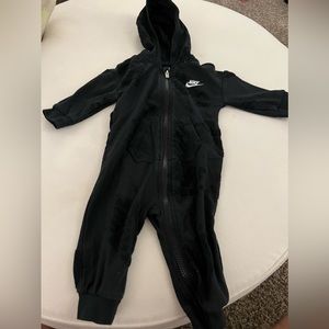 Nike one piece black zip up track suit. Size 6 mo.